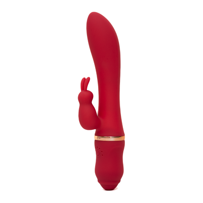 Rode FlexToyz Rabbit Vibrator met goudkleurige ring op witte achtergrond